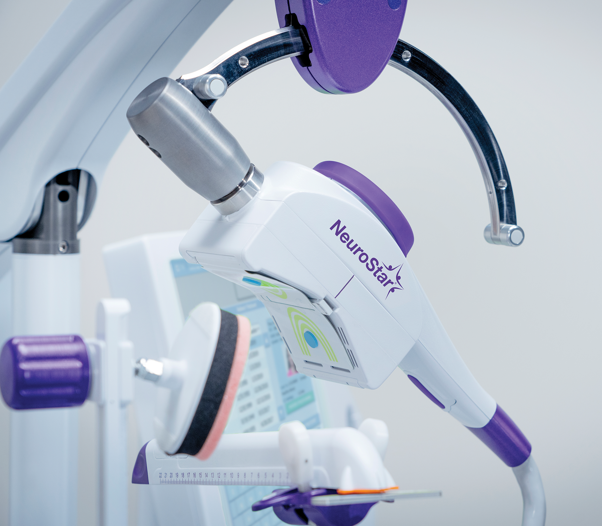NeuroStar TMS coil close-up — precision treatment device